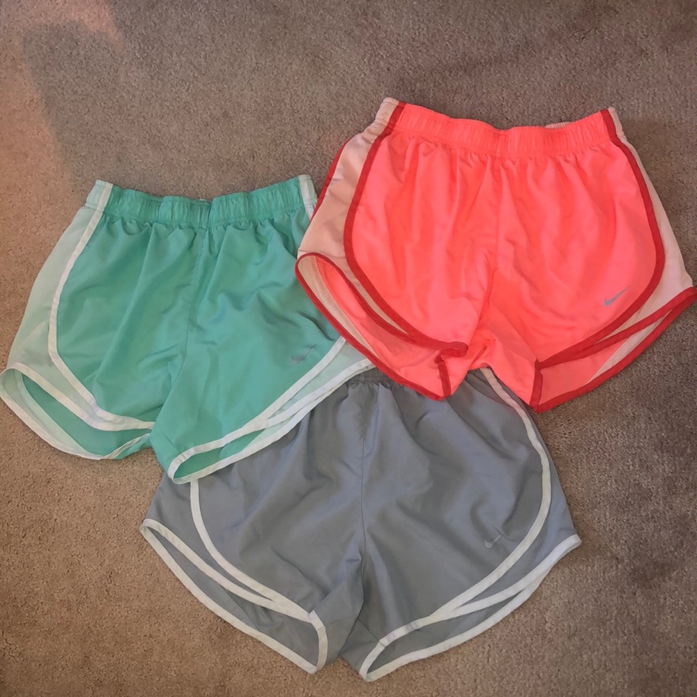 3 pairs of nike running shorts